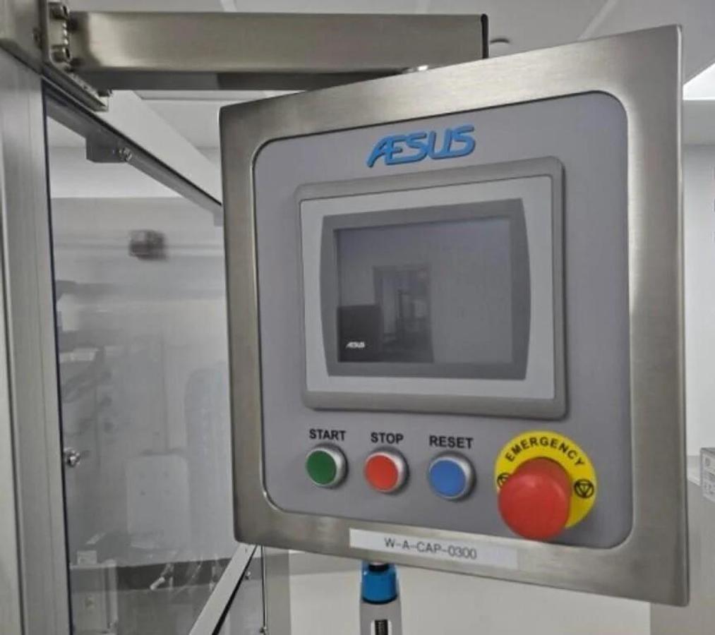 Used Used Aesus Automatic Stainless Steel Push Through (Chuck) 2 Station Capper, Model ECO-STARCAP