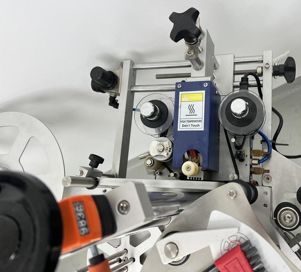 Used Used JDA Automatic Pressure Sensitive Wraparound Labeler, Model WLA-2