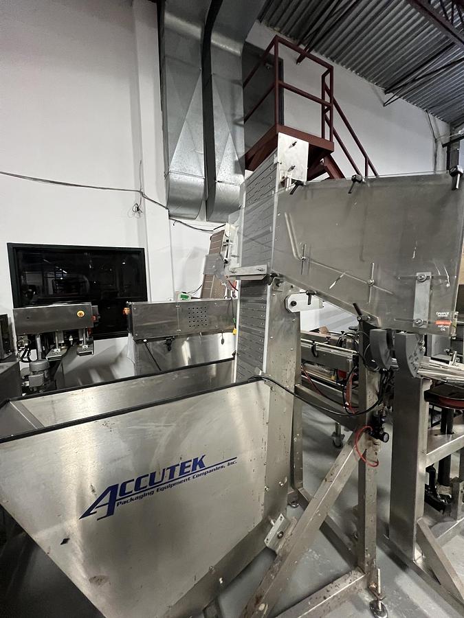 Used Used Accutek Automatic Stainless Steel 3 Quill Inline Capper with Cap Hopper and Elevator