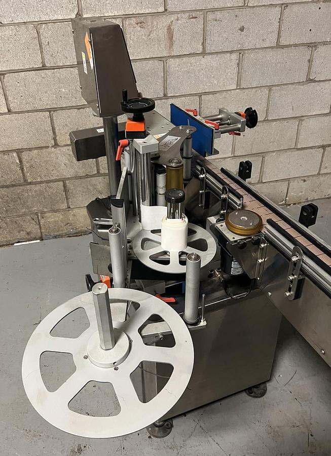 Used Used HealthCaps Automatic Pressure Sensitive Wraparound Labeler