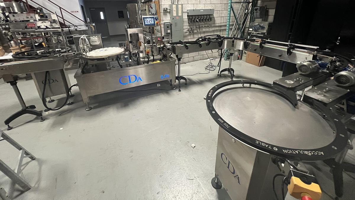 Used Used CDA E-FILL Automatic Monobloc Liquid Filling and Packaging Line, Model E-FILL