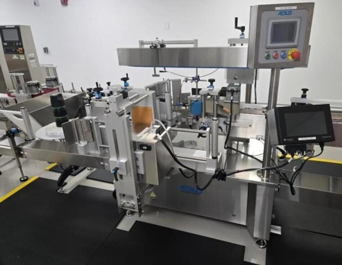 Used Used Aesus Automatic Stainless Steel Panel and Wrap Pressure Sensitive Labeler, Model Eco-Panel