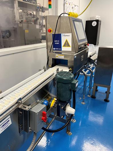 Used 150' (approx) of Nercon Stainless Steel motorized conveyor