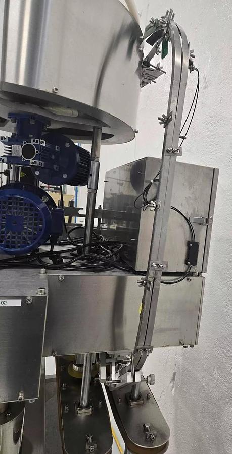 Used Used Automatic Inline Quill Capper, Model XGC – 100