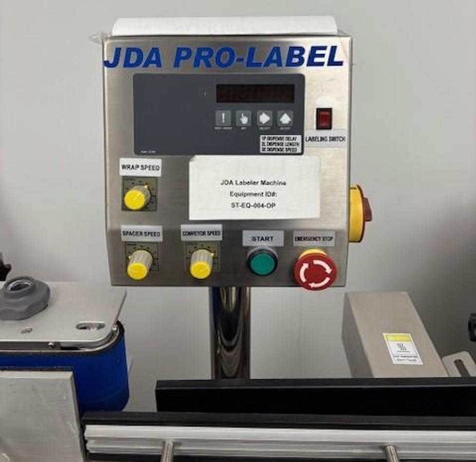 Used Used JDA Automatic Pressure Sensitive Wraparound Labeler, Model WLA-2