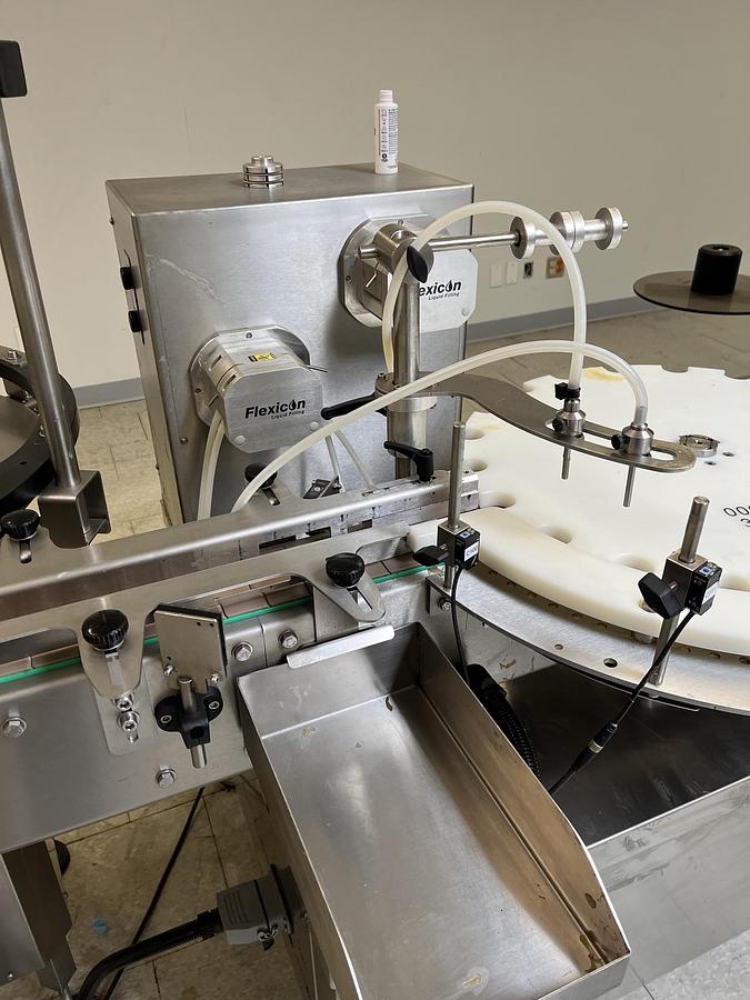 Used Used CDA E-FILL Automatic Liquid Filling and Packaging Line, Model E-FILL