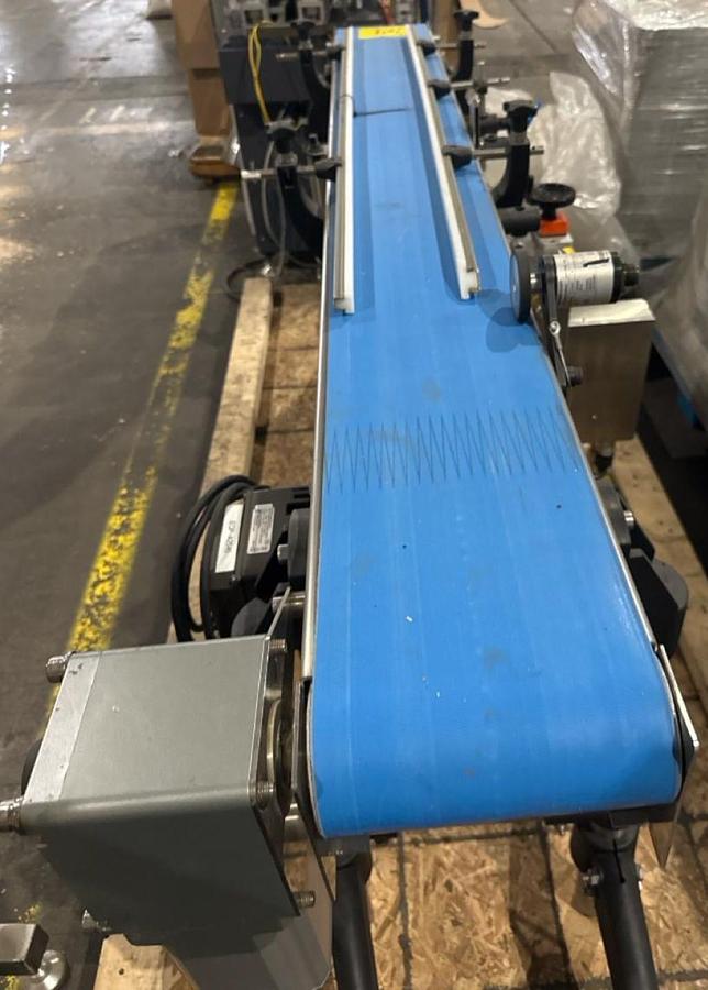 Used Used Stainless Steel 71” long x 8-1/2” wide motorized conveyor