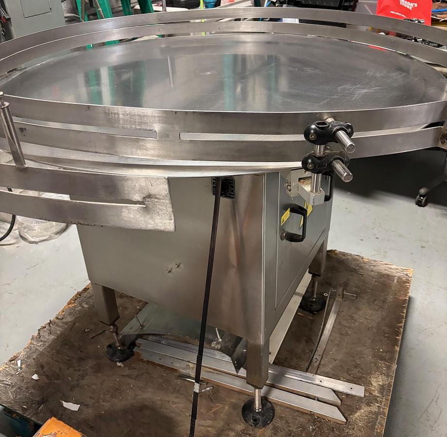 Used Used Capmatic 48” Stainless Steel Accumulating Table
