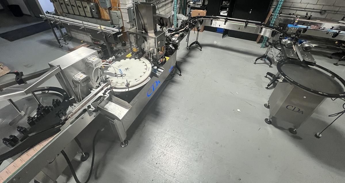 Used Used CDA E-FILL Automatic Monobloc Liquid Filling and Packaging Line, Model E-FILL