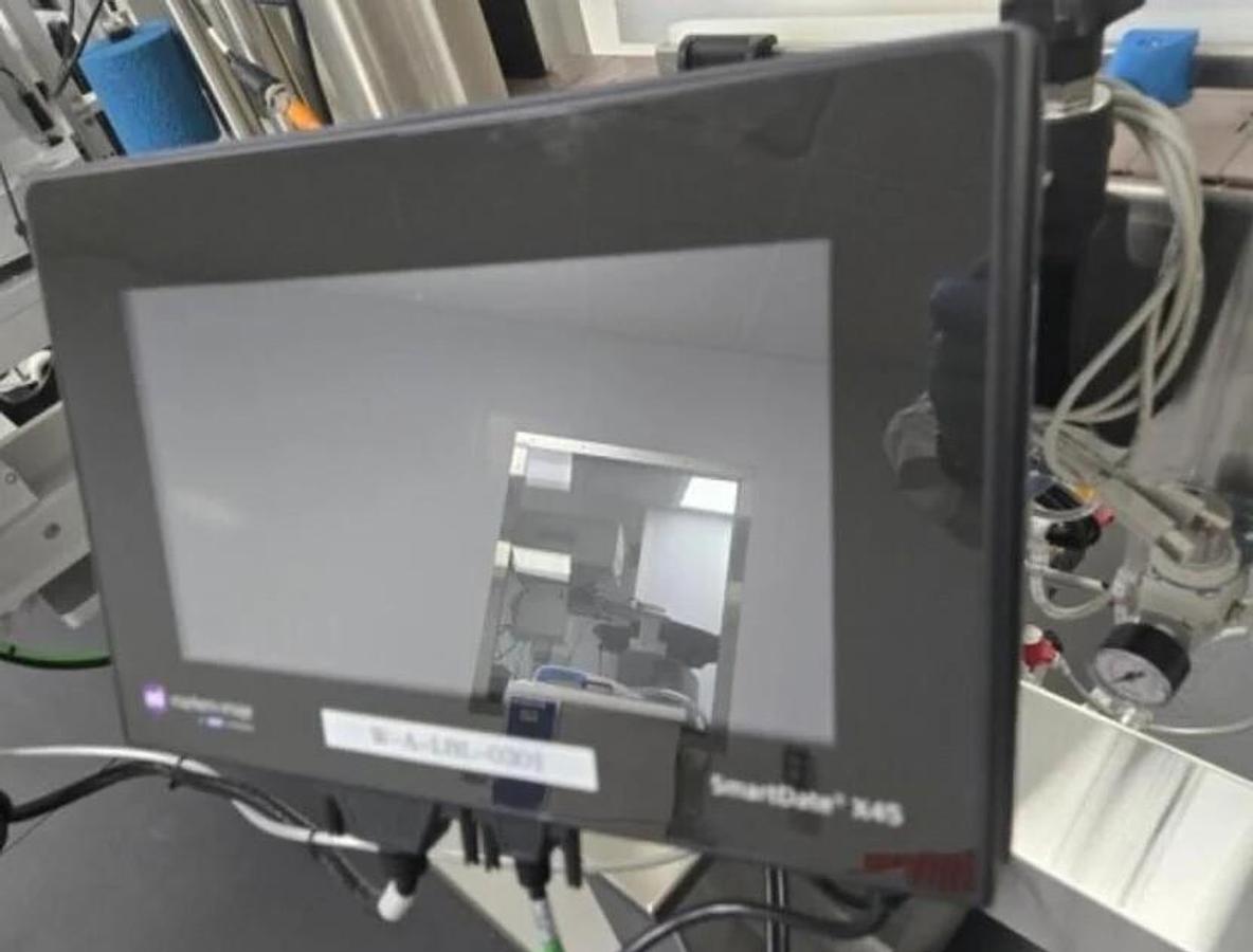 Used Used Aesus Automatic Stainless Steel Panel and Wrap Pressure Sensitive Labeler, Model Eco-Panel