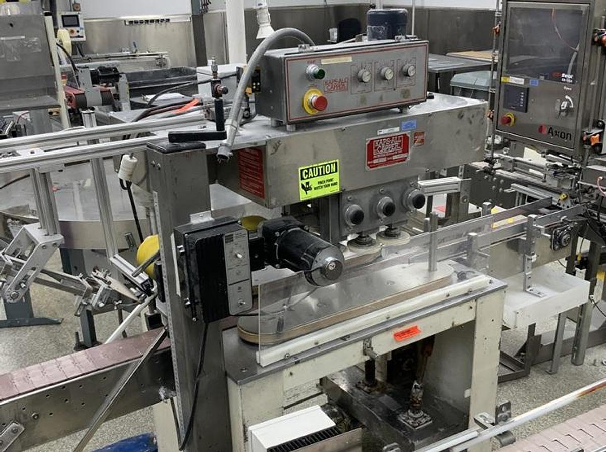 Used Used Kaps All 6 spindle/3 quill Automatic Inline Capper, Model A with Cap Hopper/Elevator