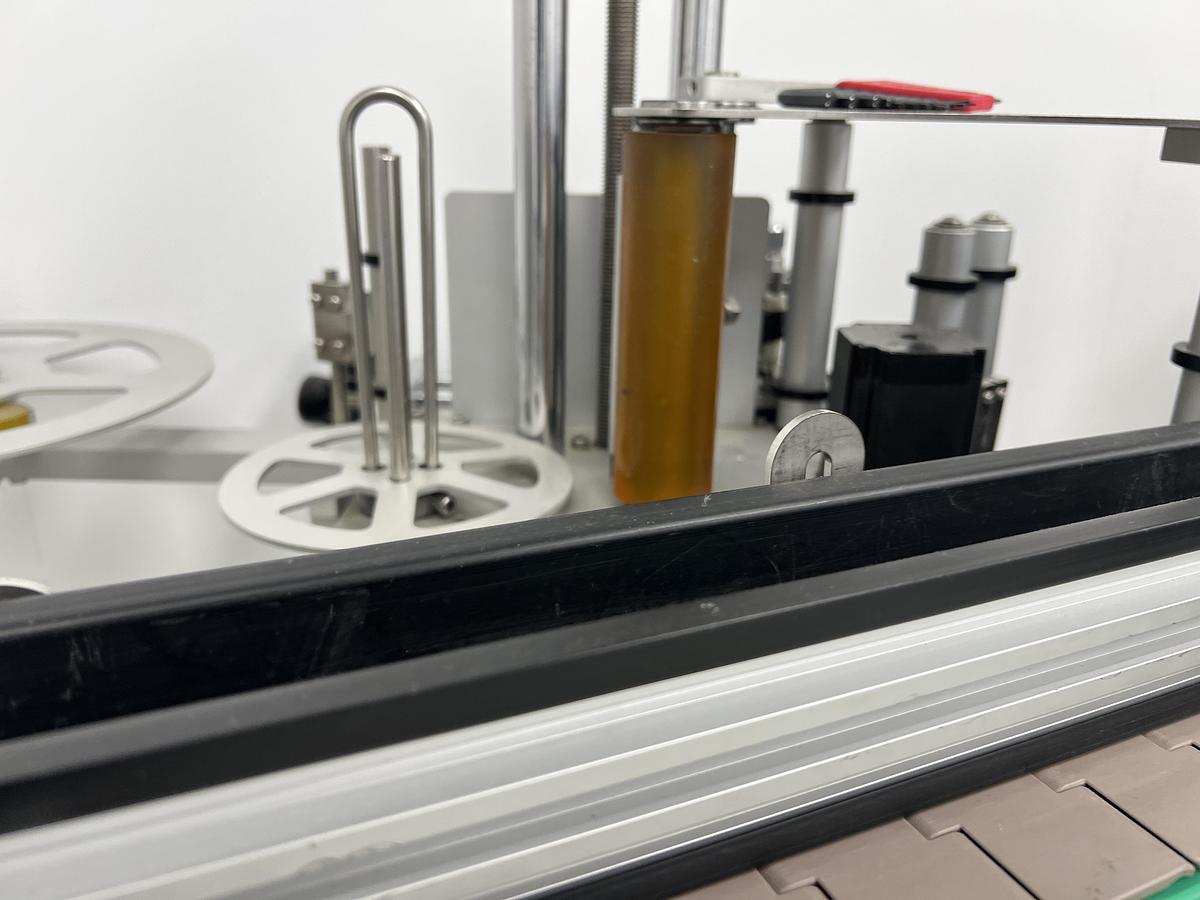 Used Used JDA Automatic Pressure Sensitive Wraparound Labeler, Model WLA-2