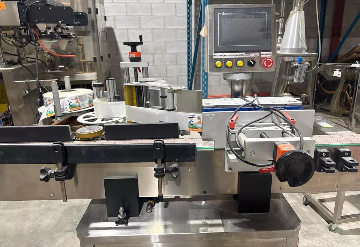 Used Used HealthCaps Automatic Pressure Sensitive Wraparound Labeler