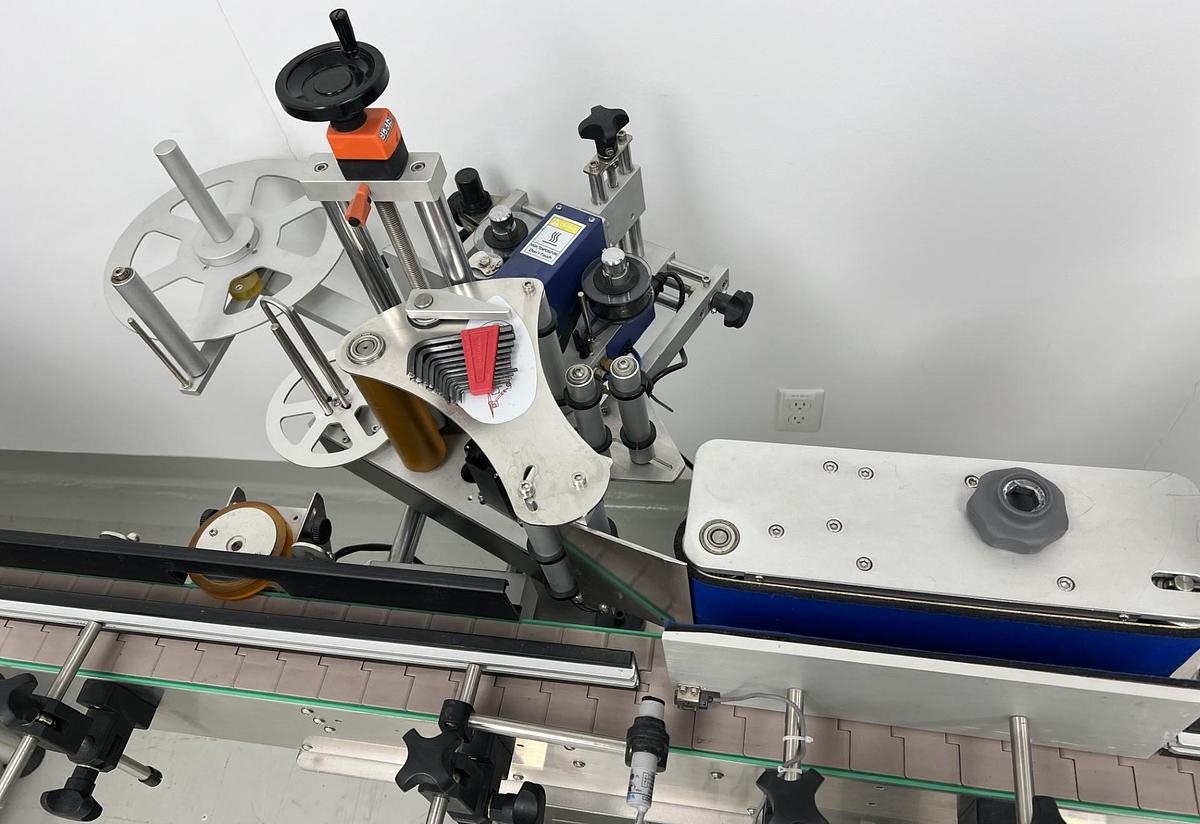 Used Used JDA Automatic Pressure Sensitive Wraparound Labeler, Model WLA-2