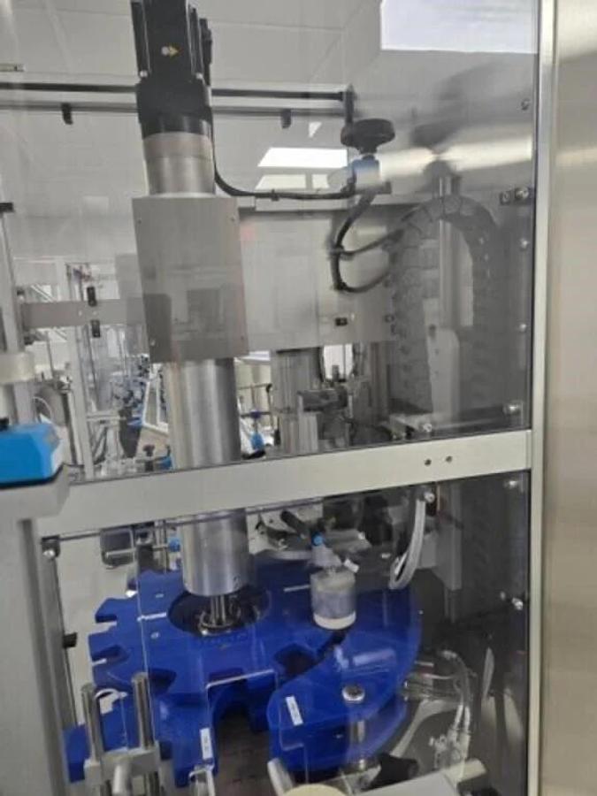 Used Used Aesus Automatic Stainless Steel Push Through (Chuck) 2 Station Capper, Model ECO-STARCAP