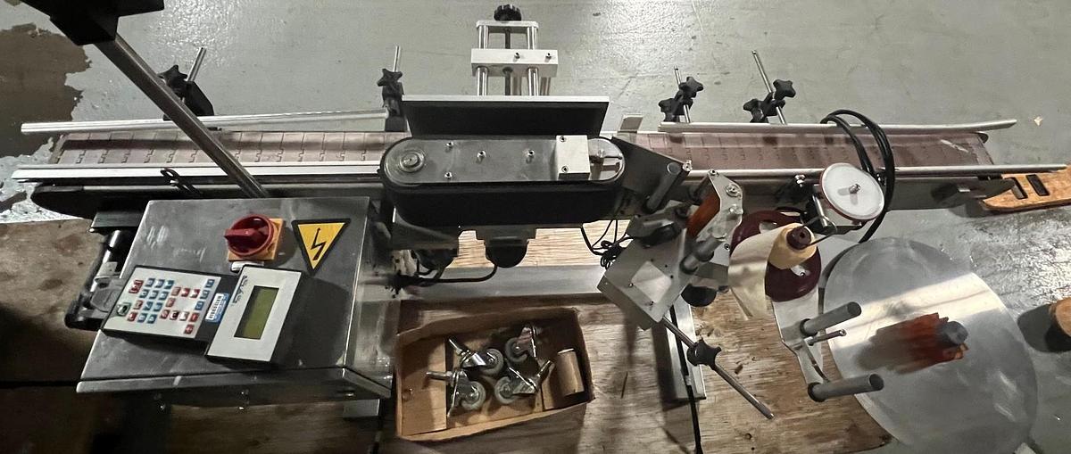 Used Used CVC Automatic Pressure Sensitive Wrap Around Labeler, Model 330-II