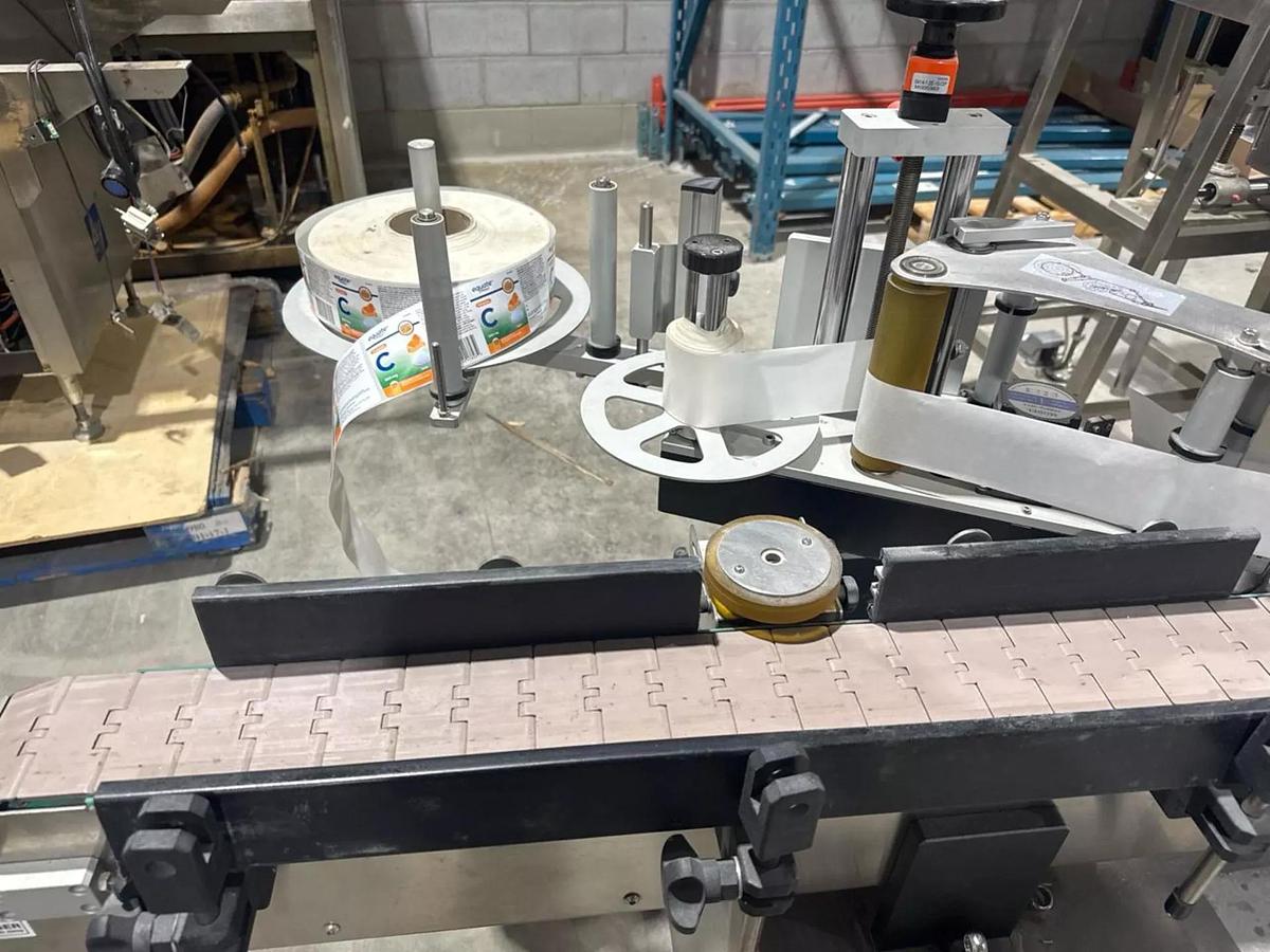 Used Used HealthCaps Automatic Pressure Sensitive Wraparound Labeler