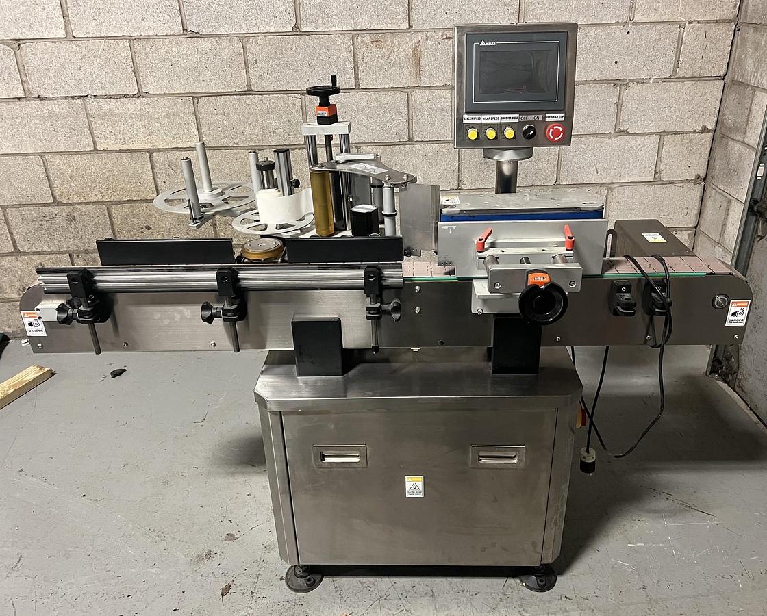 Used Used HealthCaps Automatic Pressure Sensitive Wraparound Labeler