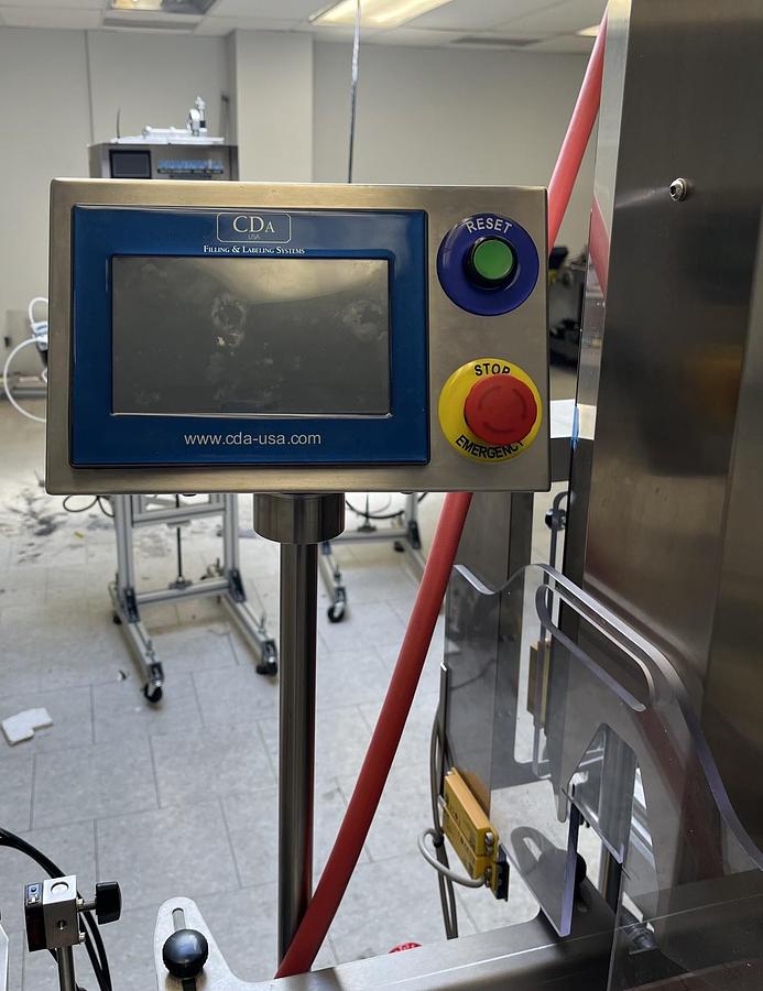 Used Used CDA E-FILL Automatic Liquid Filling and Packaging Line, Model E-FILL