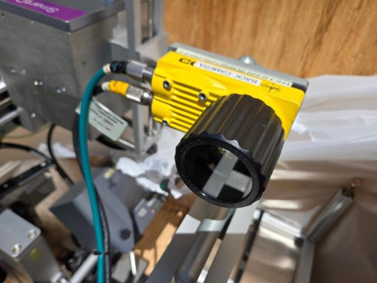 Used Used LSI Automatic Pressure Sensitive Front and Back Labeler, Model 1600