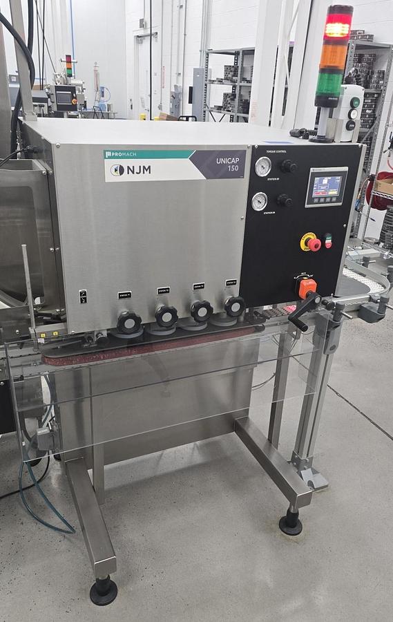 Used Used Promach - NJM Unicap 150 Automatic Stainless Steel 4 Quill Capper, Model UCAP-150-S170