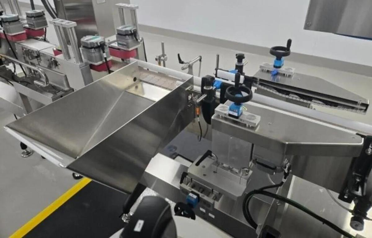 Used Used Aesus Automatic Stainless Steel Panel and Wrap Pressure Sensitive Labeler, Model Eco-Panel