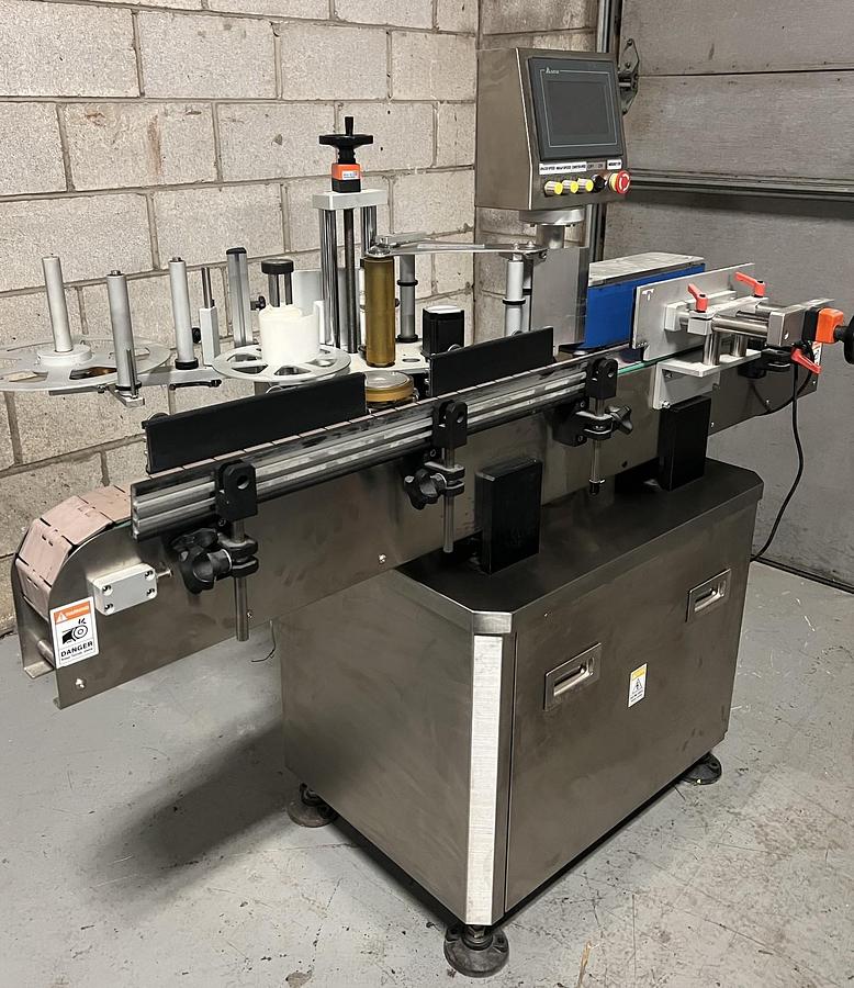 Used Used HealthCaps Automatic Pressure Sensitive Wraparound Labeler