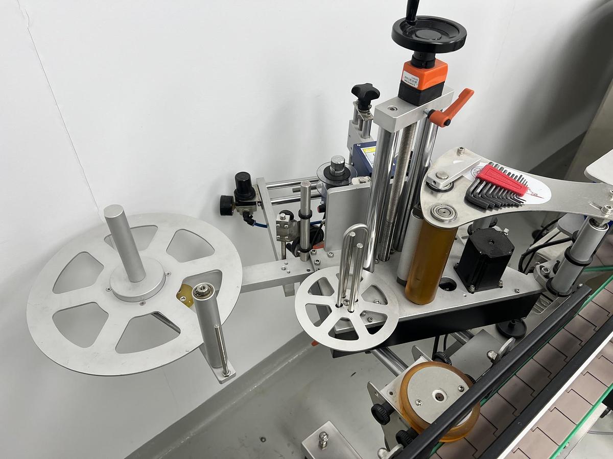 Used Used JDA Automatic Pressure Sensitive Wraparound Labeler, Model WLA-2