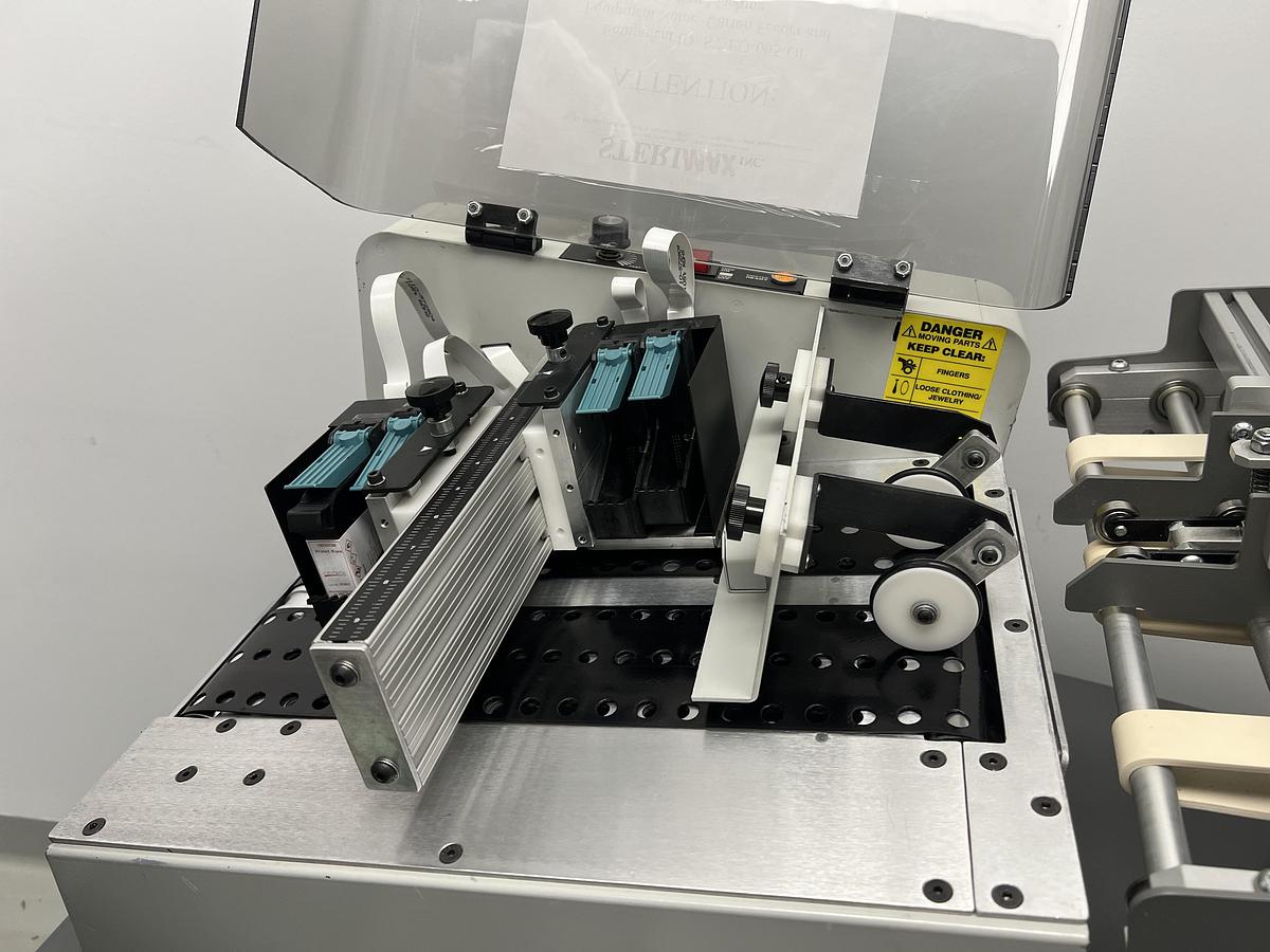 Used Used Straight Shooter Friction Feeder, Model R-14E with Accufast P4 Printer