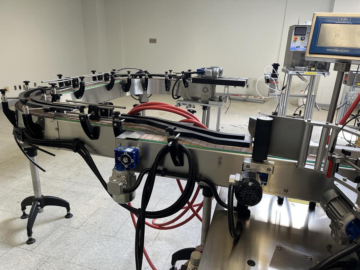 Used Used CDA E-FILL Automatic Liquid Filling and Packaging Line, Model E-FILL
