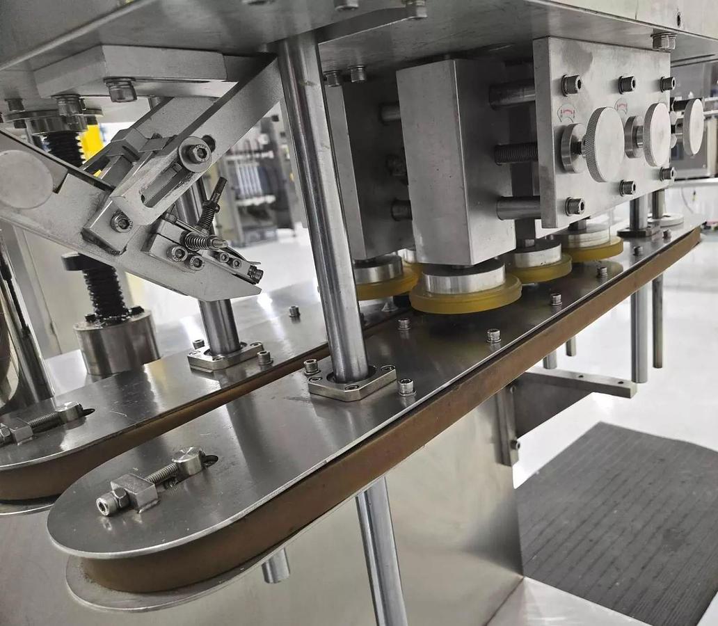 Used Used Automatic Inline Quill Capper, Model XGC – 100