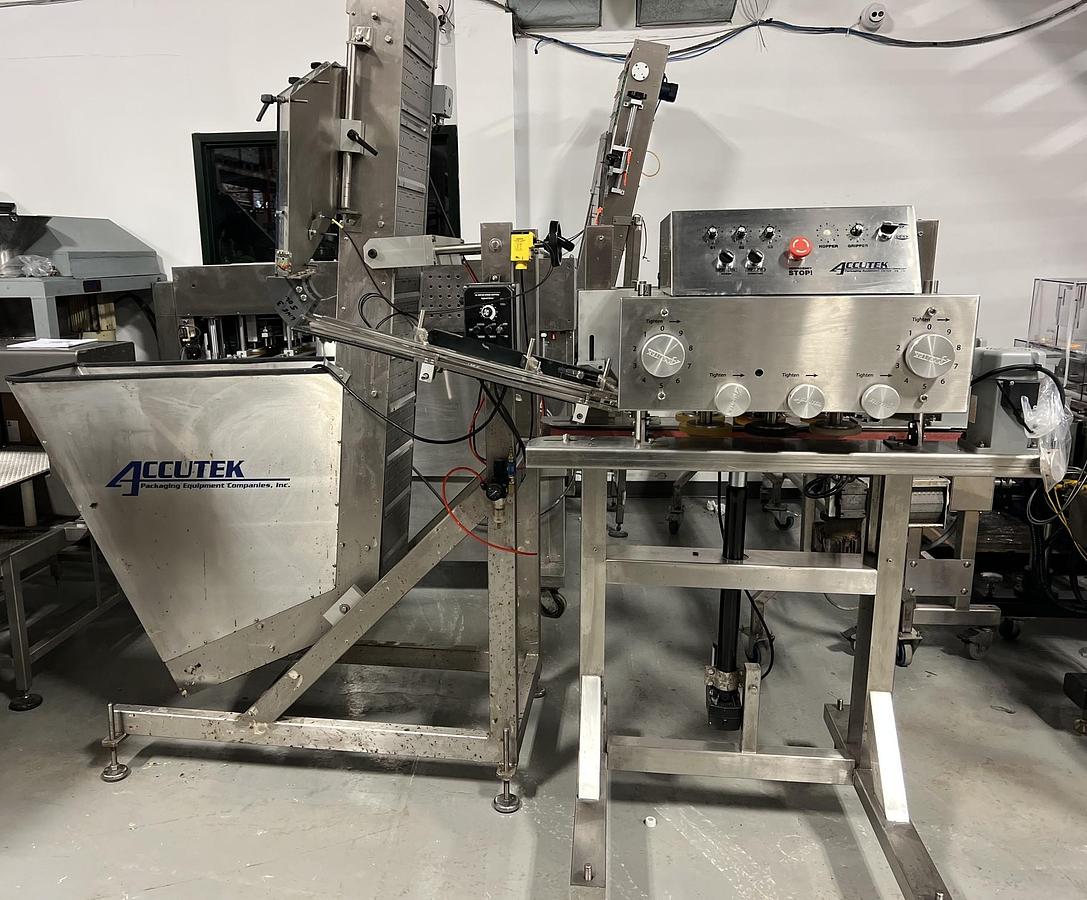 Used Used Accutek Automatic Stainless Steel 3 Quill Inline Capper with Cap Hopper and Elevator