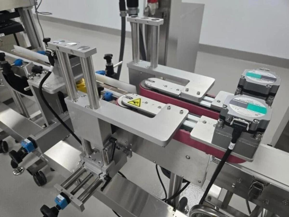 Used Used Aesus Automatic Stainless Steel Push Through (Chuck) 2 Station Capper, Model ECO-STARCAP