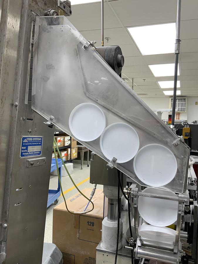 Used Used Kaps All 6 spindle/3 quill Automatic Inline Capper, Model A with Cap Hopper/Elevator