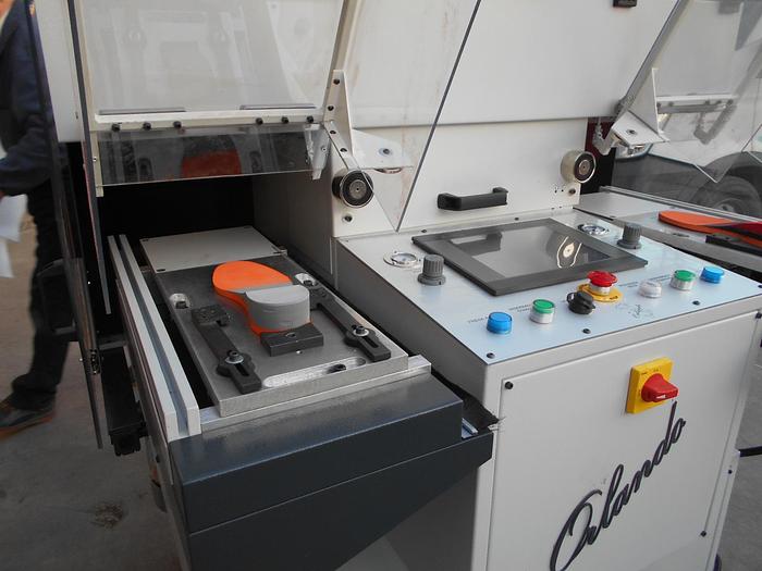 INSELLATRICE SAGOMATRICE AUTOMATICA PER SUOLE - AUTOMATIC SHAPING MACHINE
