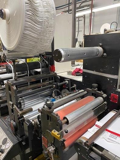 Used 13" WIDE ROTOFLEX DLI REWINDER WITH 2 STATION DIE CUTTING - RECENT DRIVE UPDATE