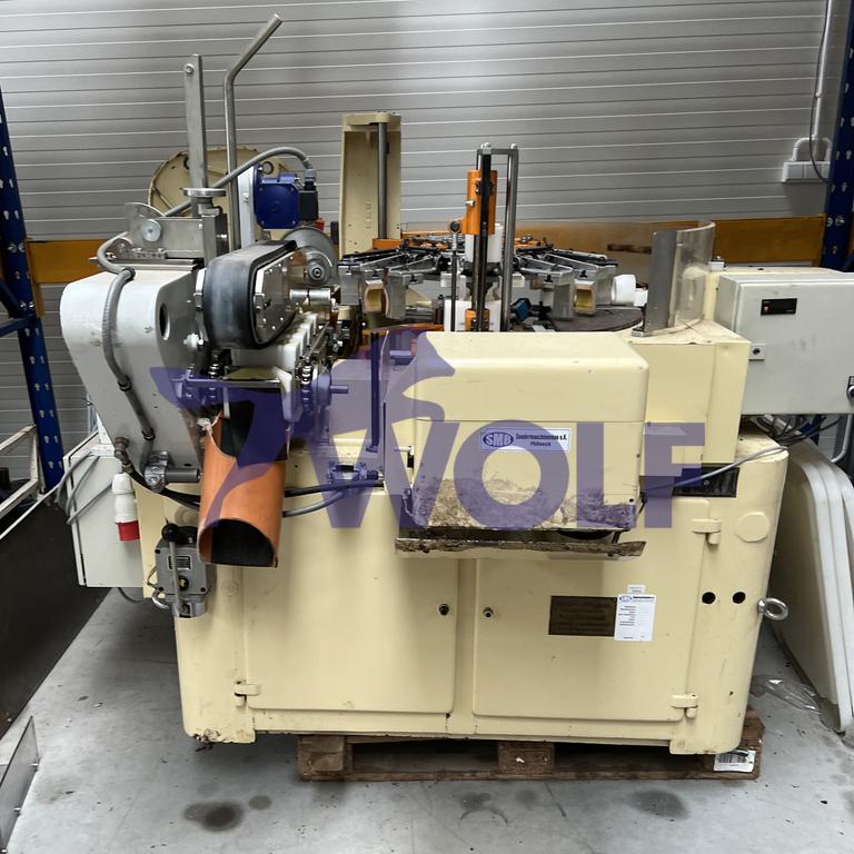 Gebraucht Stannioliermaschine RASCH - Type RG-STR, für Schokoladeneier eingerichtet.
