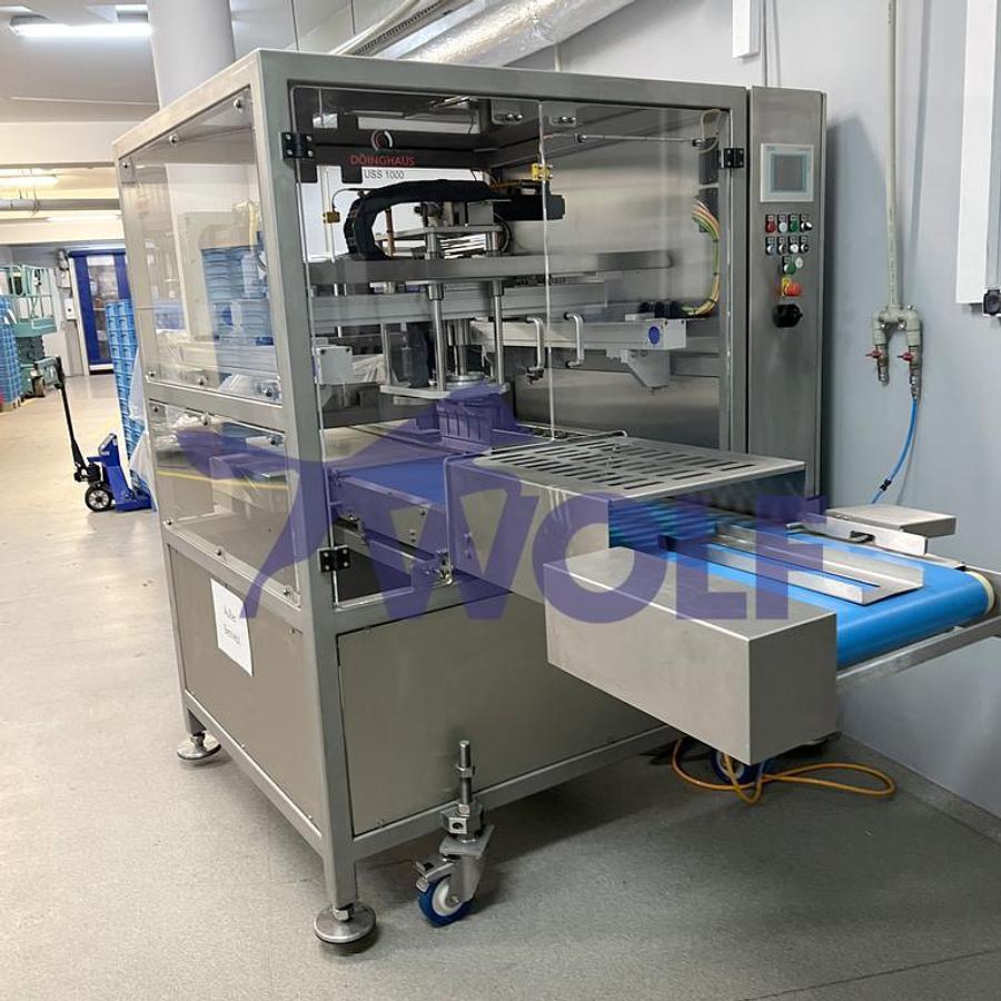 Used ultrasonic cutting machine DÖINGHAUS - type USS-1000, built in 2011.