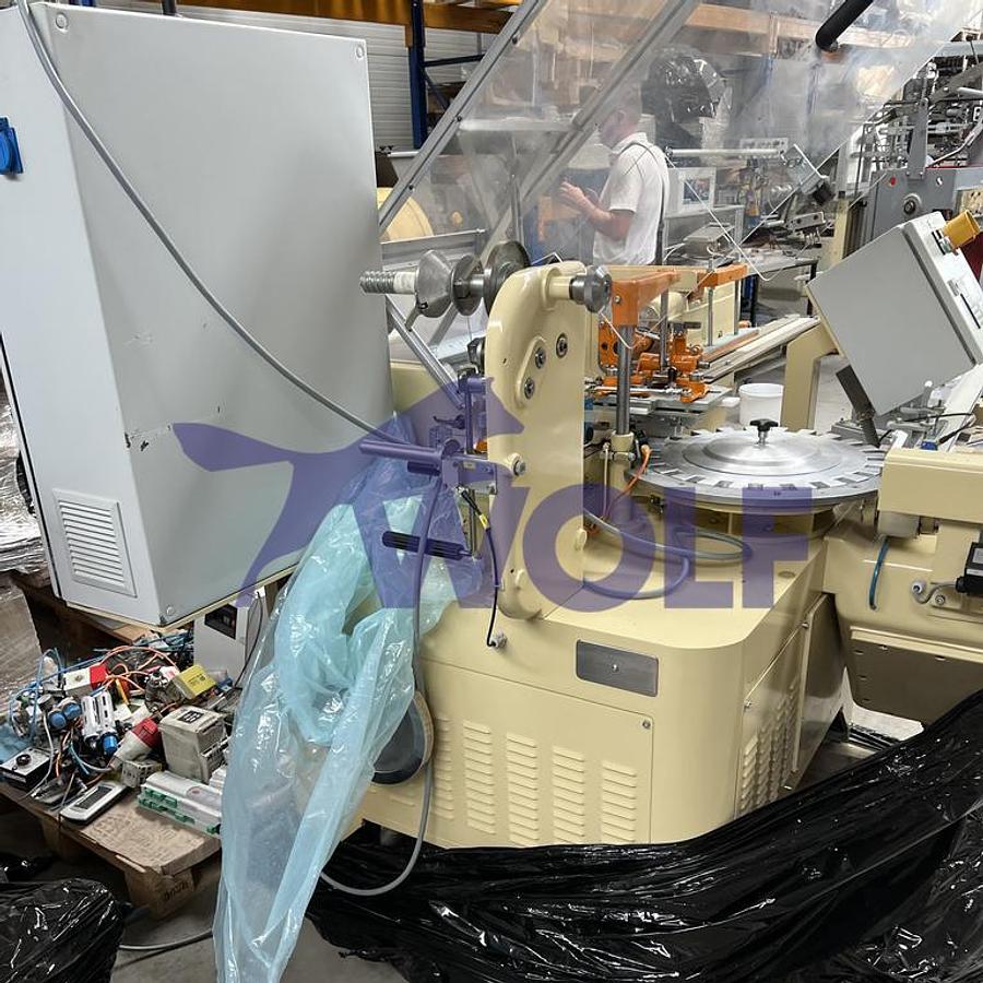 Gebraucht Stannioliermaschine RASCH - Type RK, mit Eintaktband für Flachboden-Artikel.