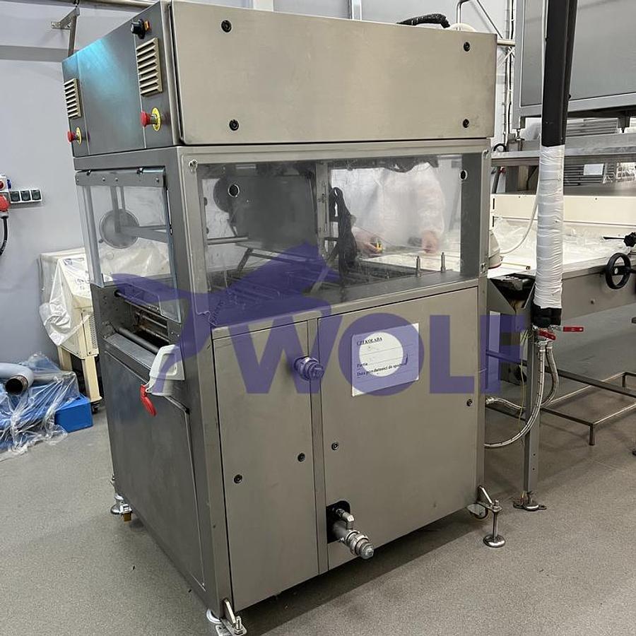 Gebraucht Überziehmaschine NIELSEN - mit ca. 620 mm Arbeitsbreite, ohne Temperierung.