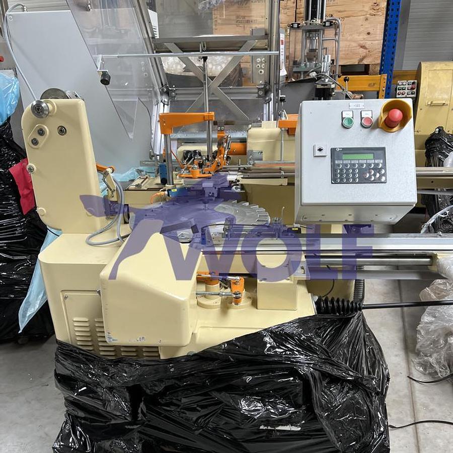 Gebraucht Stannioliermaschine RASCH - Type RK, mit Eintaktband für Flachboden-Artikel.