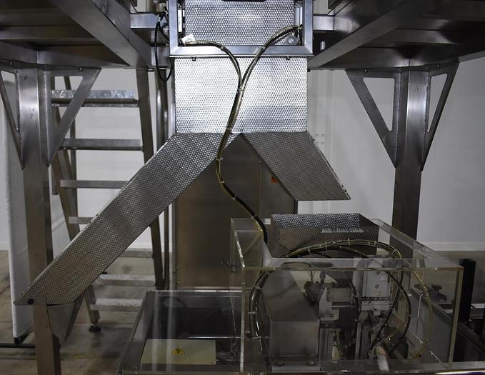 Used Apai bagger with 10 head scale