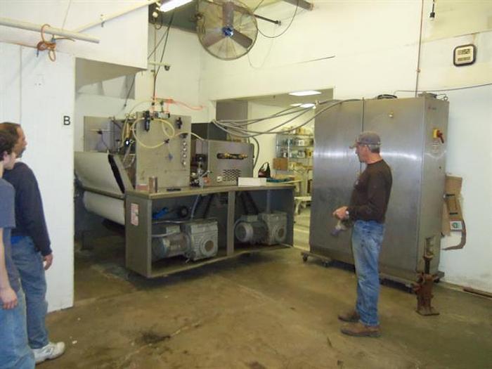 Used APV 48" TWO ROLL EXTRUDER WITH ULTRASONIC GUILLOTINE CUTTER