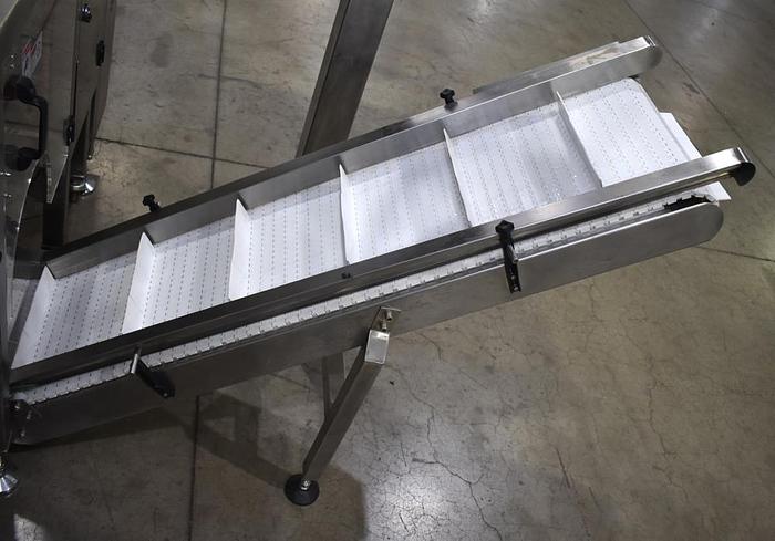 Used Apai bagger with 10 head scale