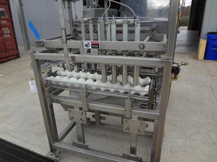 Used Raque 8 Head Piston Depositor