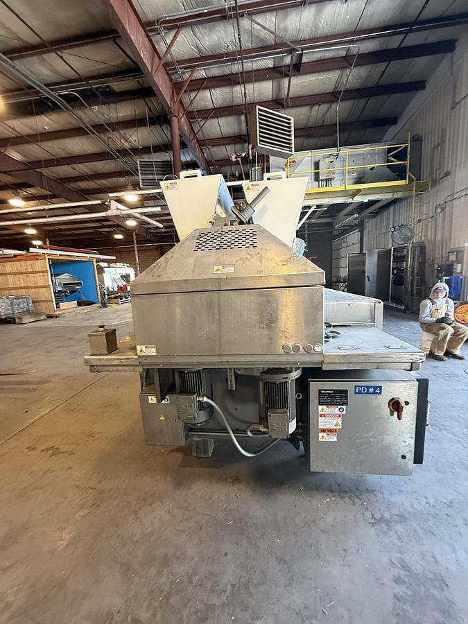 Used BAKER PERKINS 48 INCH WIDE 4 ROLL EXTRUDER