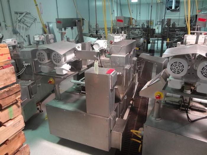 Used Rehon Dough Extruded Encruster