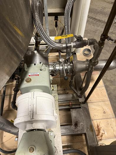 Used DUAL AB PROCESS TANKS WITH HEATERS AND PUMP