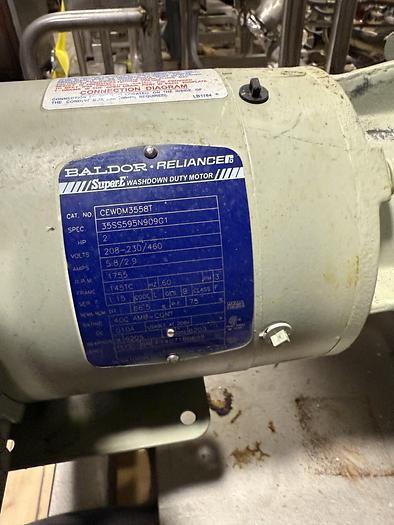 Used DUAL AB PROCESS TANKS WITH HEATERS AND PUMP