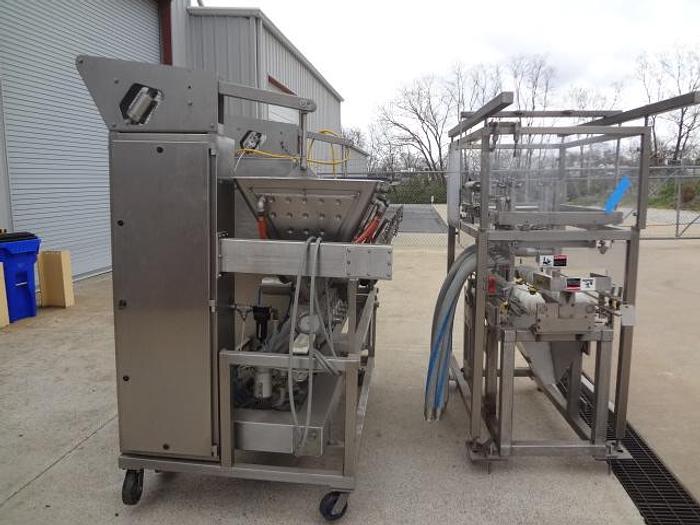 Used Raque 8 Head Piston Depositor